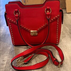 Red faux leather stud bag